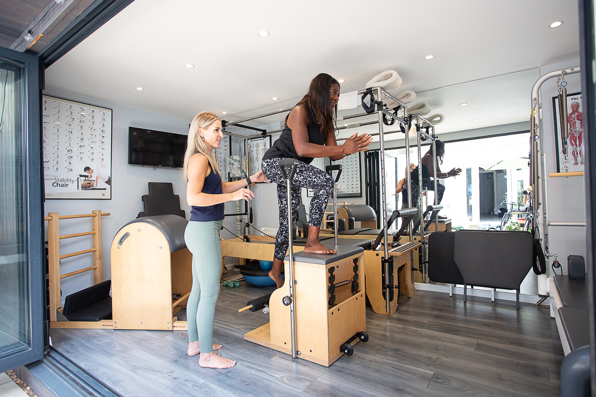 Davina providing individual movement support inside the private Balanced Wellness studio in SW17