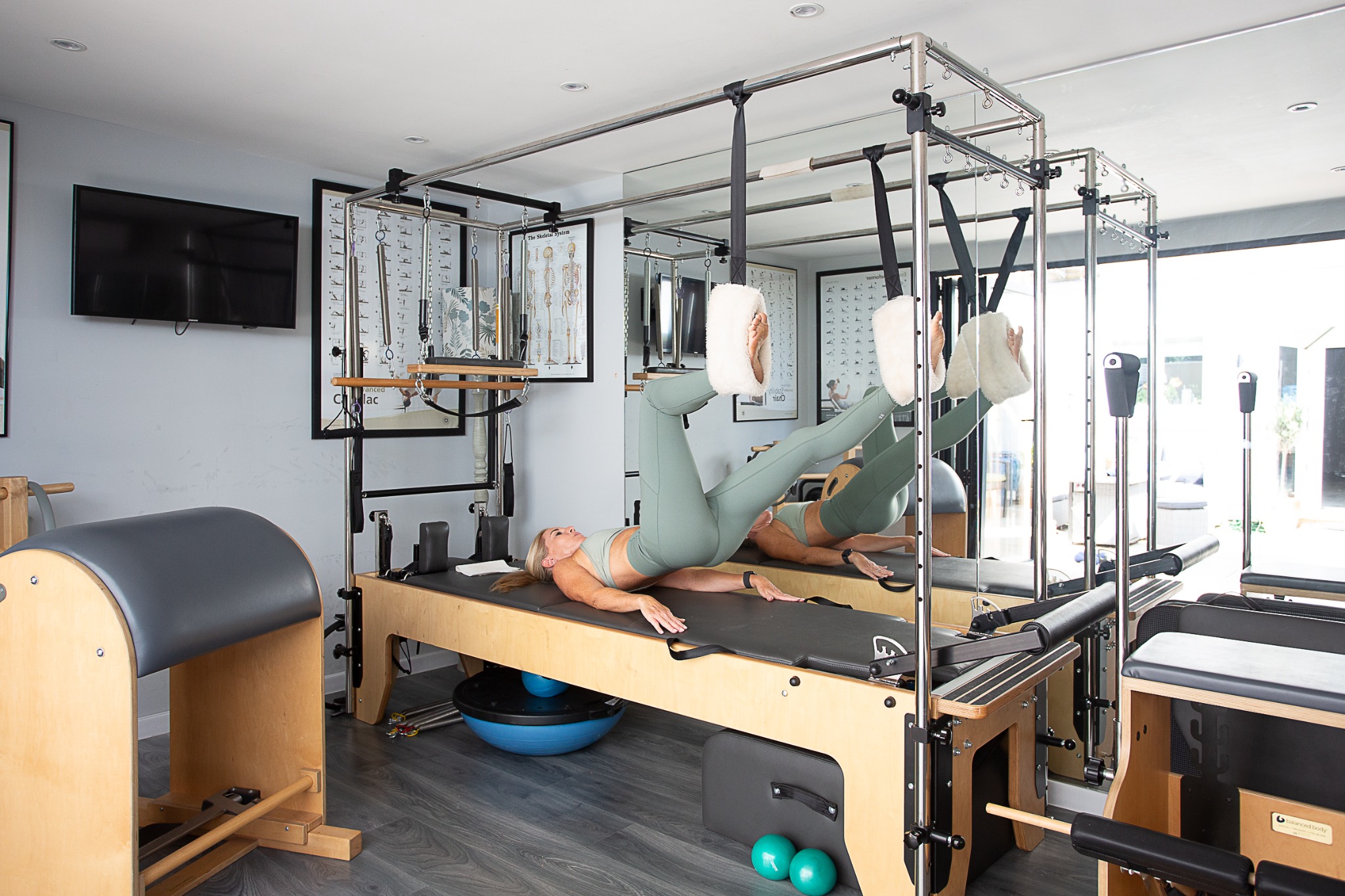 Pilates equipment and controlled movement at Balanced Wellness